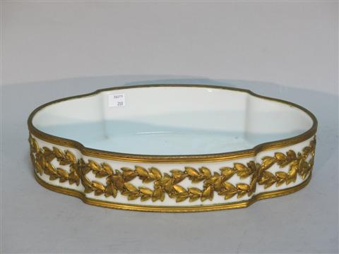 Appraisal: GILT METAL MOUNTED CENTERPIECE Continental shaped oval with straight sides