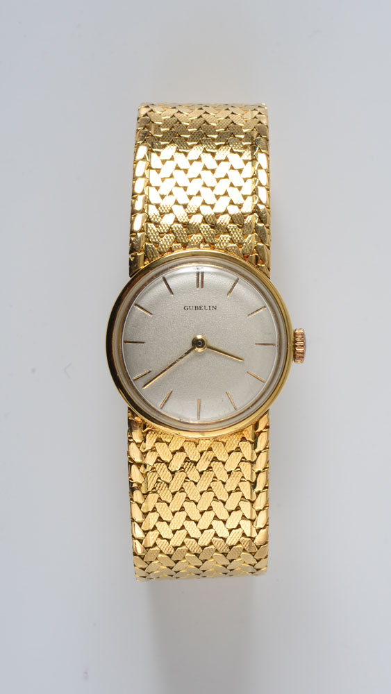 Appraisal: LADY'S K GOLD WRISTWATCH GUBELIN The round case with a