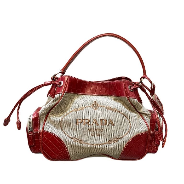 Appraisal: Prada Canvas Shoulder Bag This stylish tote is crafted of