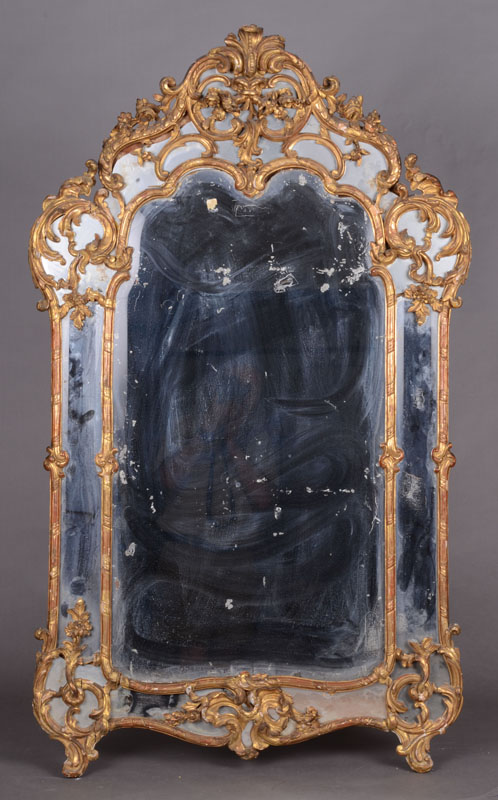 Appraisal: LOUIS XV GILTWOOD MIRROR The arched beveled mirror plate within