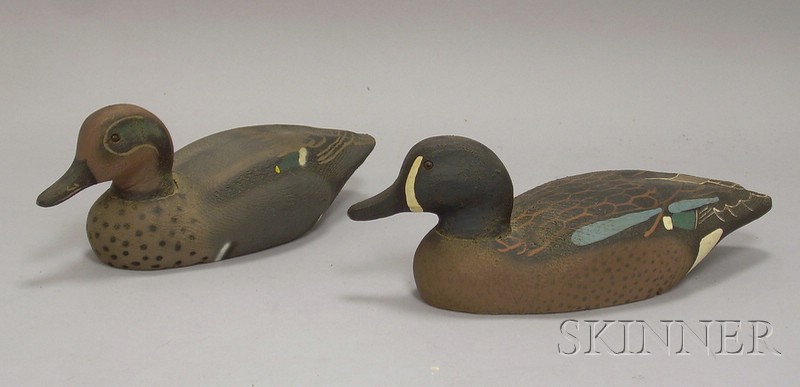 Appraisal: Pair of Herter's Factory Blue Wing Teal Decoys Herter's Manufacturing