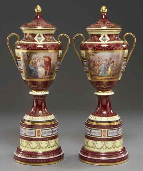 Appraisal: Pr Royal Vienna style porcelain covered urnseach with a burgundy