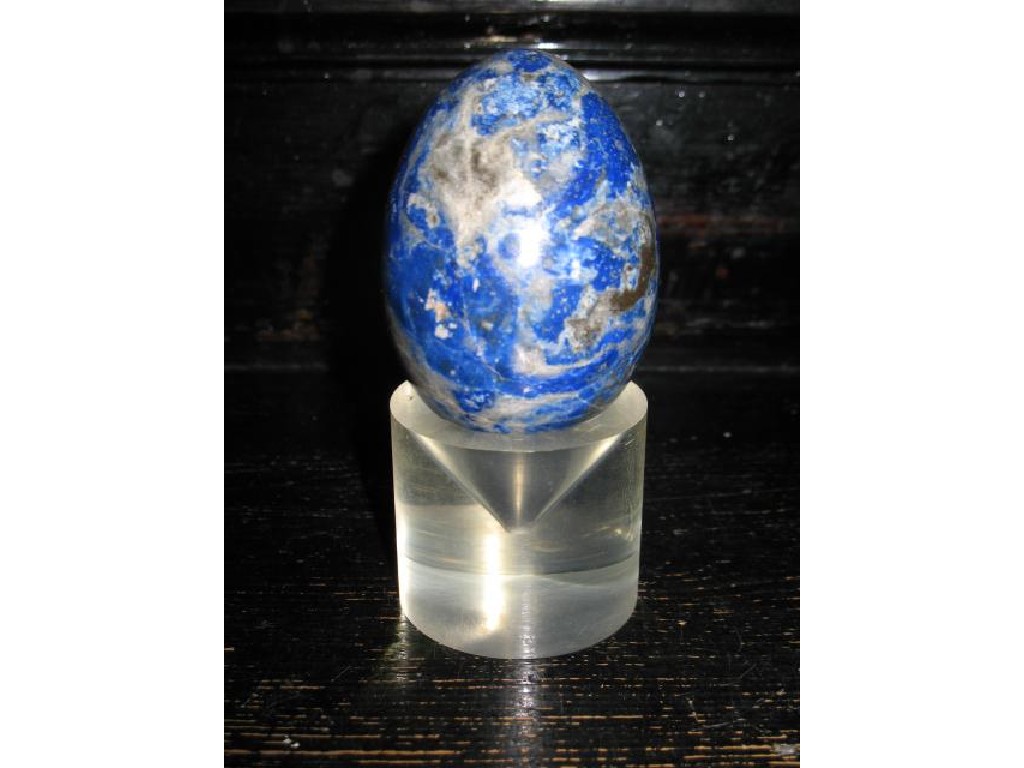 Appraisal: A LAPIS LAZULI EGG a turquoise stone fish and an