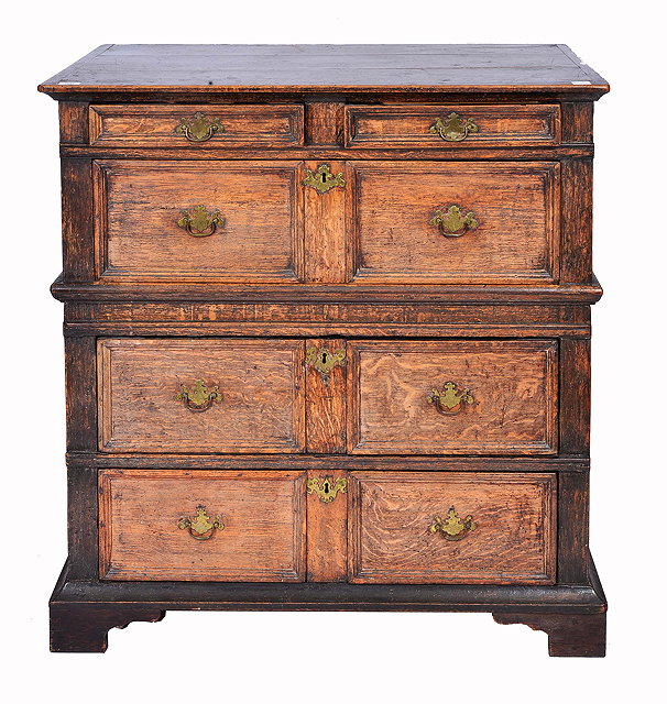 Appraisal: A TH CENTURY STYLE OAK CHEST constructed in two sections