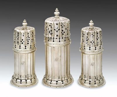 Appraisal: A suite of three Charles II casters with corrugated cylindrical