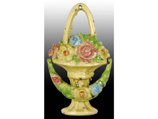 Appraisal: Mixed Flowers in Basket Cast Iron Doorknocker Description Great detail