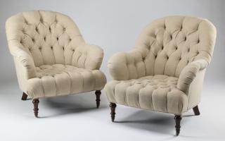 Appraisal: English Pair of button tufted English-style armchairs upholstered in neutral