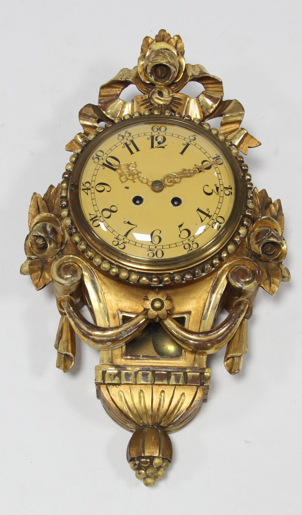 Appraisal: A Swedish gilt framed cartel clock the circular dial with