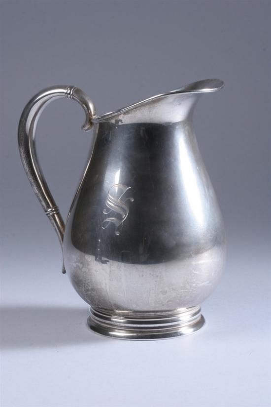 Appraisal: INTERNATIONAL STERLING SILVER PITCHER Bulbous body with C-scroll handle 'S'