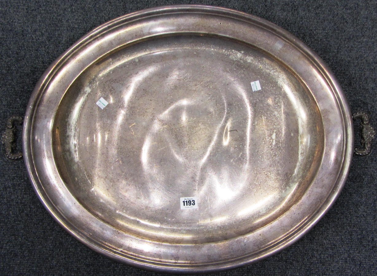 Appraisal: A large plated on copper oval twin handled serving dish