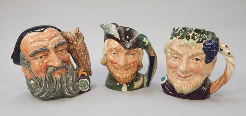 Appraisal: Three large Royal Doulton character jugs Bacchus Robin Hood and