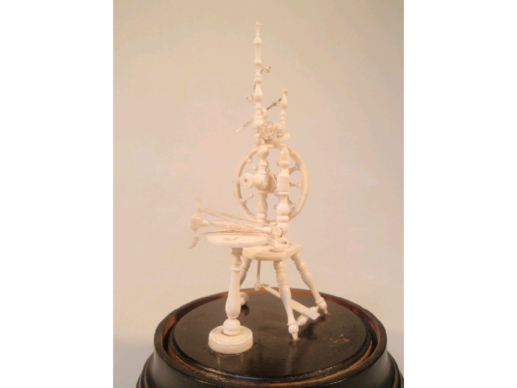 Appraisal: A late thC Dieppe carved ivory spinning wheel high mounted