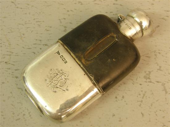 Appraisal: Victorian silver glass and leather hip flask Sheffield h in