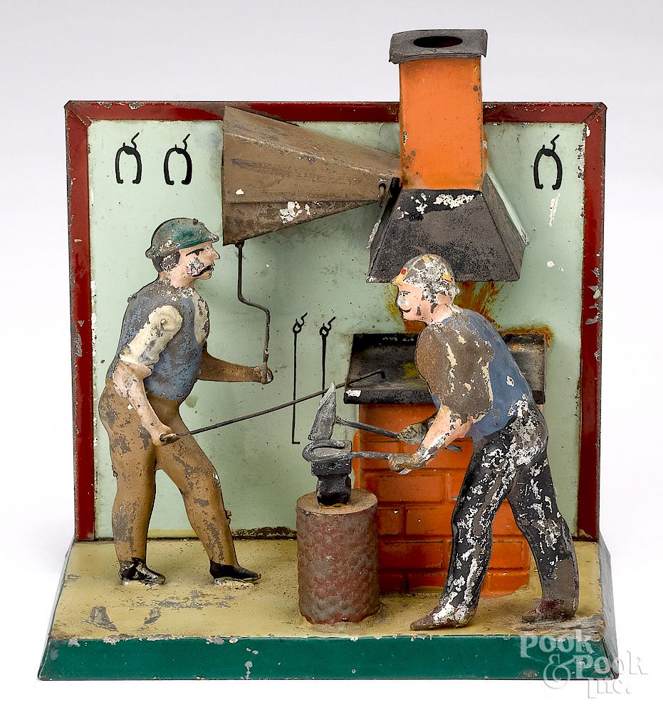 Appraisal: Becker blacksmith shop steam toy accessory Becker painted tin blacksmith