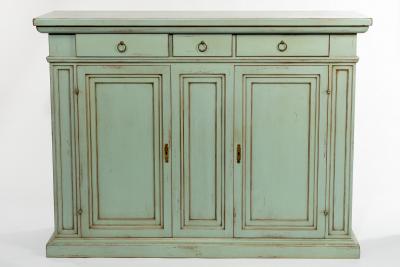 Appraisal: A green painted cupboard with drawers over each cupboard enclosed