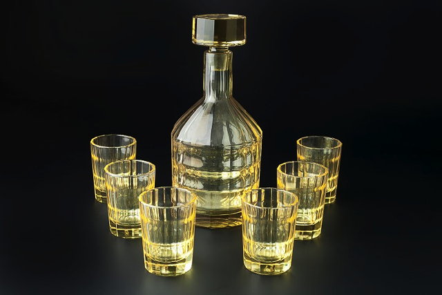 Appraisal: Art DecoLiquer set in yellow cut glassprobably Frenchcomprising decanter and