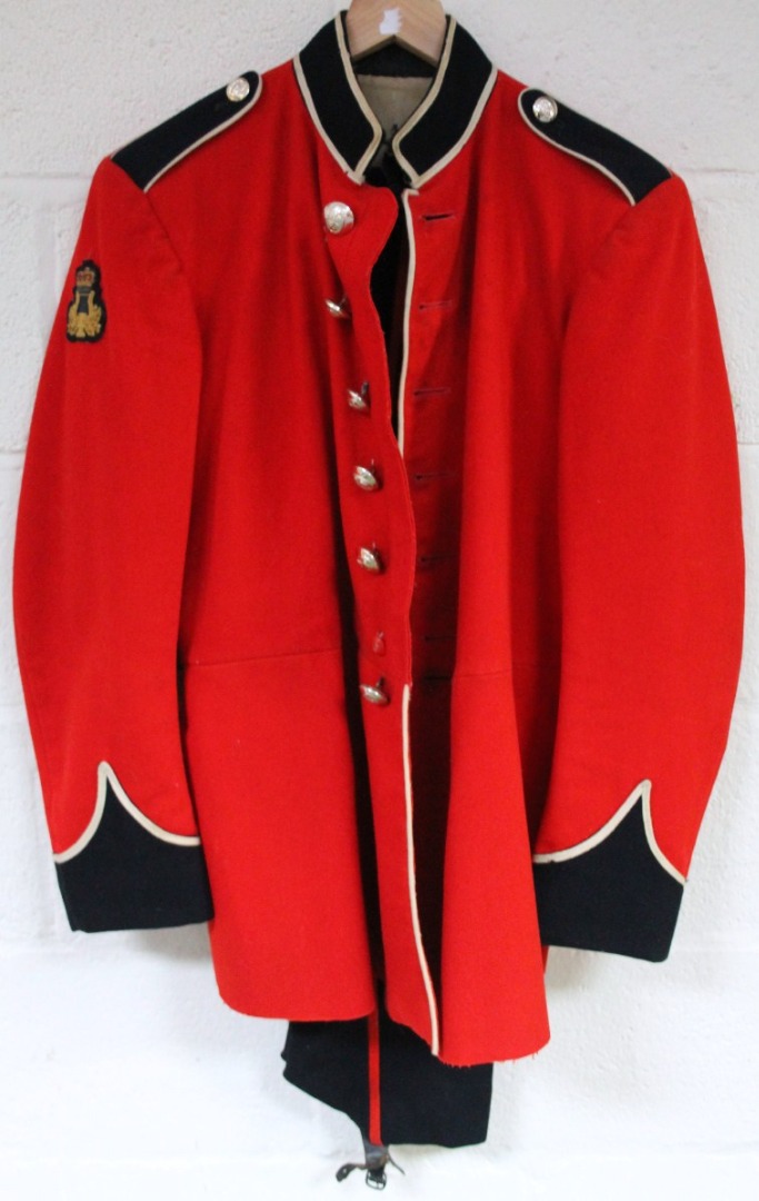 Appraisal: An officer or guardsman's uniform comprising red tunic with dark