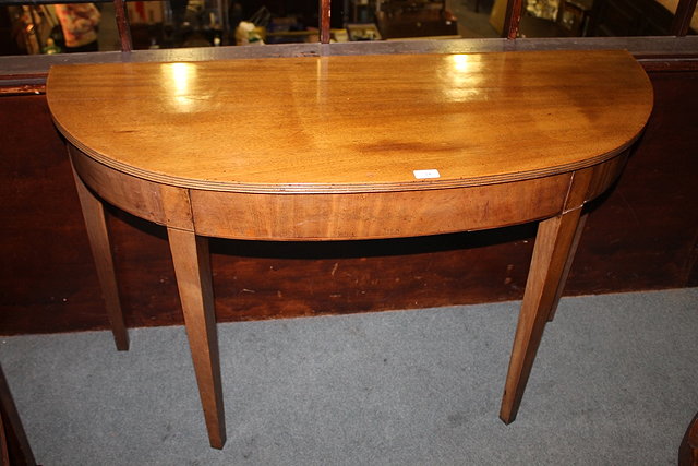 Appraisal: A TH CENTURY MAHOGANY 'D' SHAPED SIDE TABLE fitted one