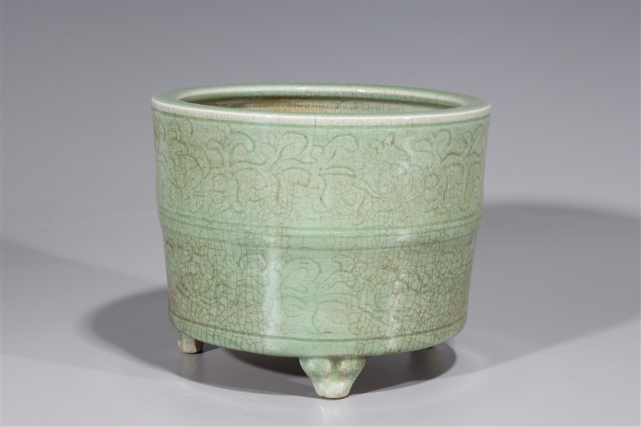 Appraisal: Chinese celadon glazed tripod ceramic censer Ming style with incised