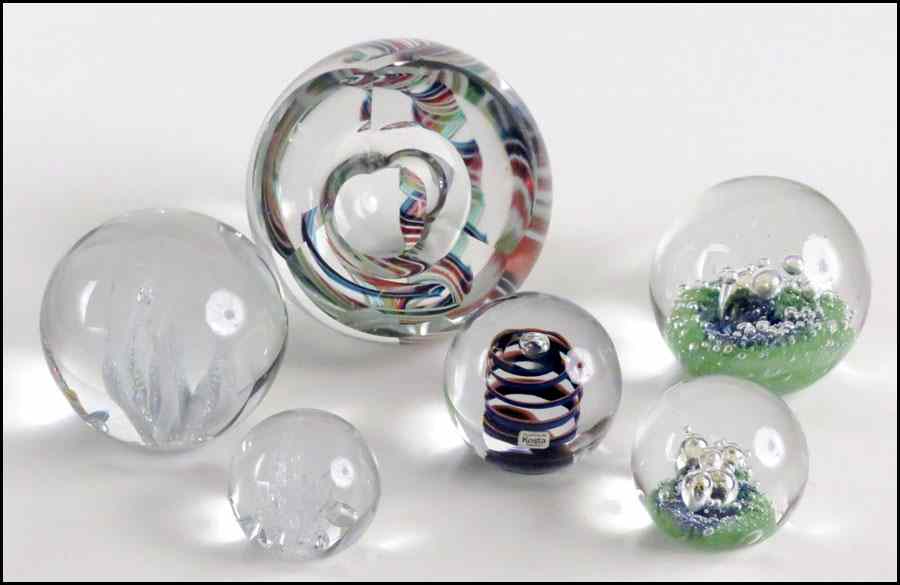 Appraisal: FIVE KOSTA GLASS PAPERWEIGHTS Together with an unsigned contemporary glass