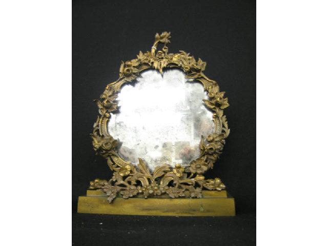 Appraisal: French Bronzed Dressing Mirror ornate floral wreath original looking glass