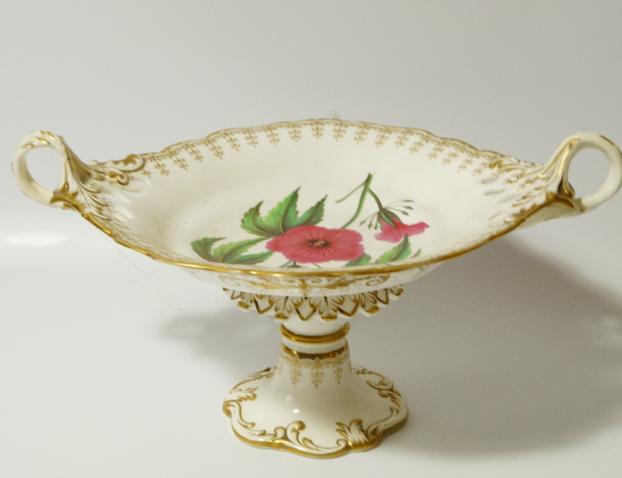 Appraisal: A late thC semi-porcelain comport the shaped outline centred with