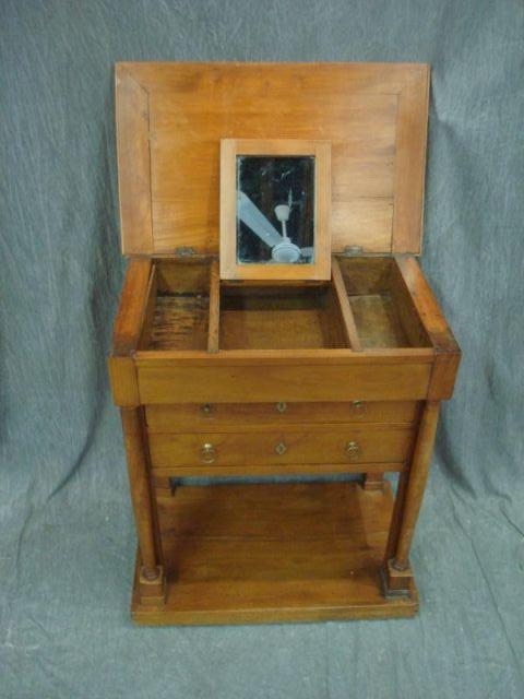 Appraisal: th Cent Lift Top Vanity Empire style with mirror and