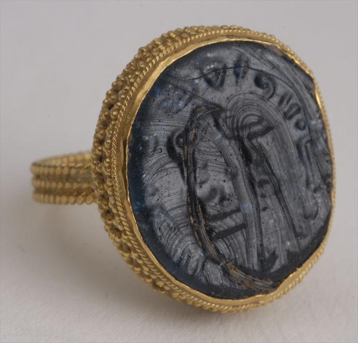 Appraisal: ISLAMIC-STYLE INTAGLIO STONE SET IN A CRENELATED MOUNT Approx size