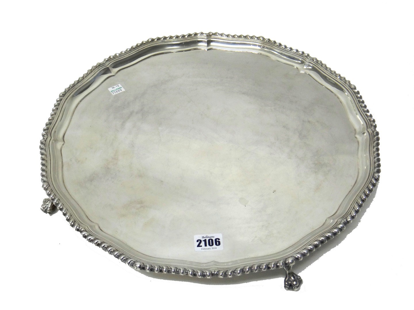 Appraisal: A silver salver of shaped circular form decorated with a