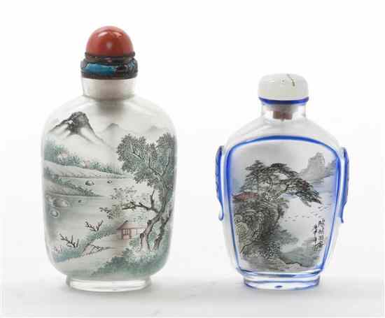 Appraisal: A Pair of Glass Snuff Bottles decorated with wooded mountainous