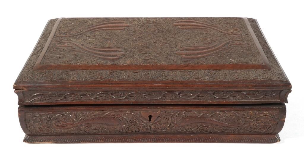 Appraisal: Beautifully carved wooden box completely covered with vines and fish