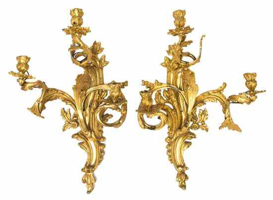 Appraisal: A Pair of Louis XV Style Gilt Bronze Three-Light Sconces