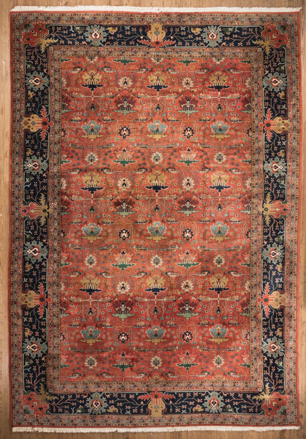 Appraisal: Persian Rug red ground dark blue border overall stylized floral