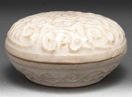 Appraisal: Chinese white glaze and molded ceramic covered circular-form box th