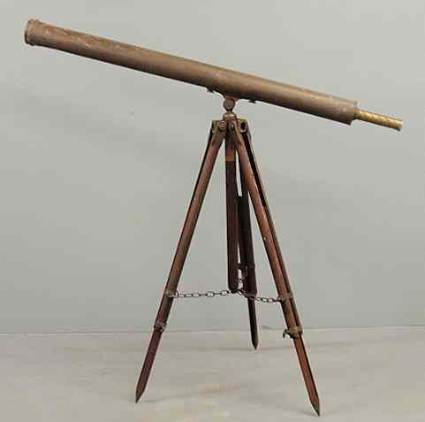 Appraisal: Large brass telescope c with four adjustable oak legs l