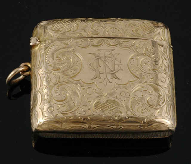 Appraisal: An antique gold vesta The rectangular vesta with engraved floral