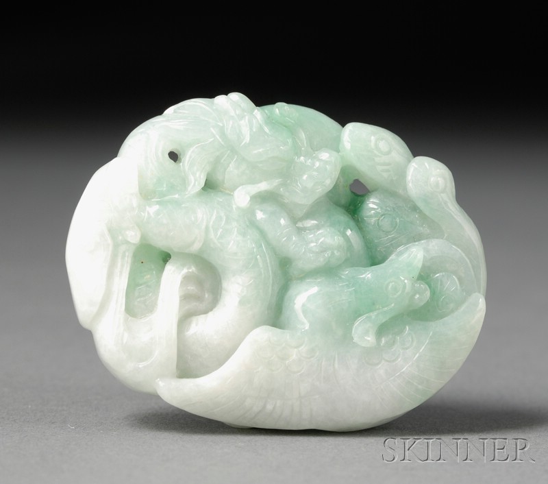 Appraisal: Jade Pendant pale green with bright green areas carving of