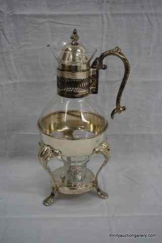 Appraisal: Vintage Silverplate Glass Carafe This is likely a vintage Princess