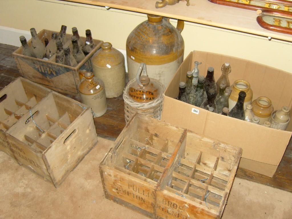 Appraisal: A quantity of stoneware and glass bottles and jars including