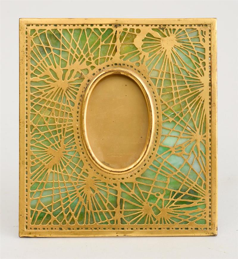 Appraisal: TIFFANY STUDIOS GILT-BRONZE AND FAVRILLE GLASS PICTURE FRAME IN THE