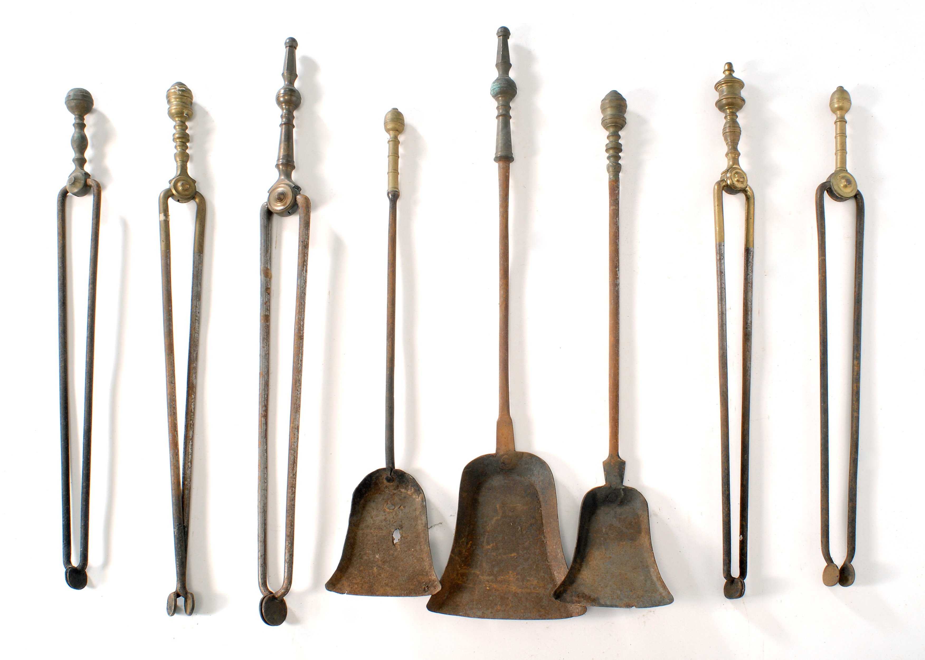 Appraisal: EIGHT ANTIQUE BRASS FIRE TOOLS First Half of the th