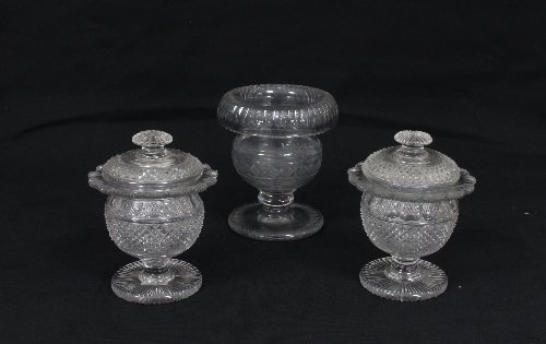 Appraisal: A pair of Irish cut glass pedestal bowls and covers