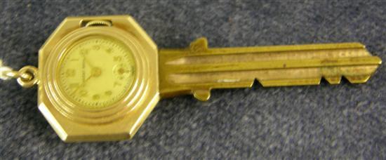 Appraisal: A LAMBERT BROS GOLD MOUNTED KEY WATCH with white enamel