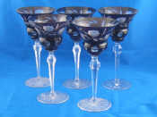 Appraisal: A set of five cut glass wine goblets the deep