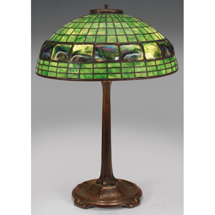 Appraisal: Fine Tiffany Studios lamp bronze base supporting a leaded turtle-back