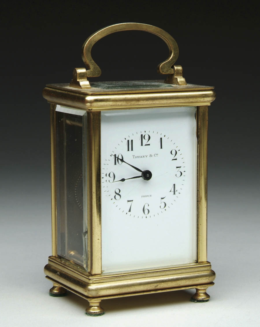 Appraisal: TIFFANY COMPANY CLOCK Brass carriage clock made in France Eleven