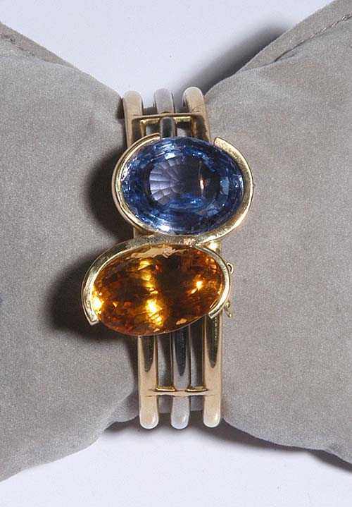 Appraisal: SAPPHIRE AND CITRINE BANGLE ca White and yellow gold Casual