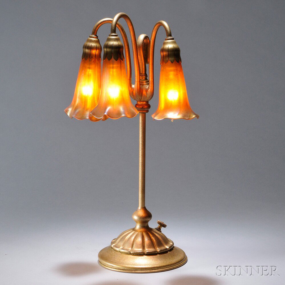 Appraisal: Tiffany Studios Three Light Table Lamp Patinated bronze art glass