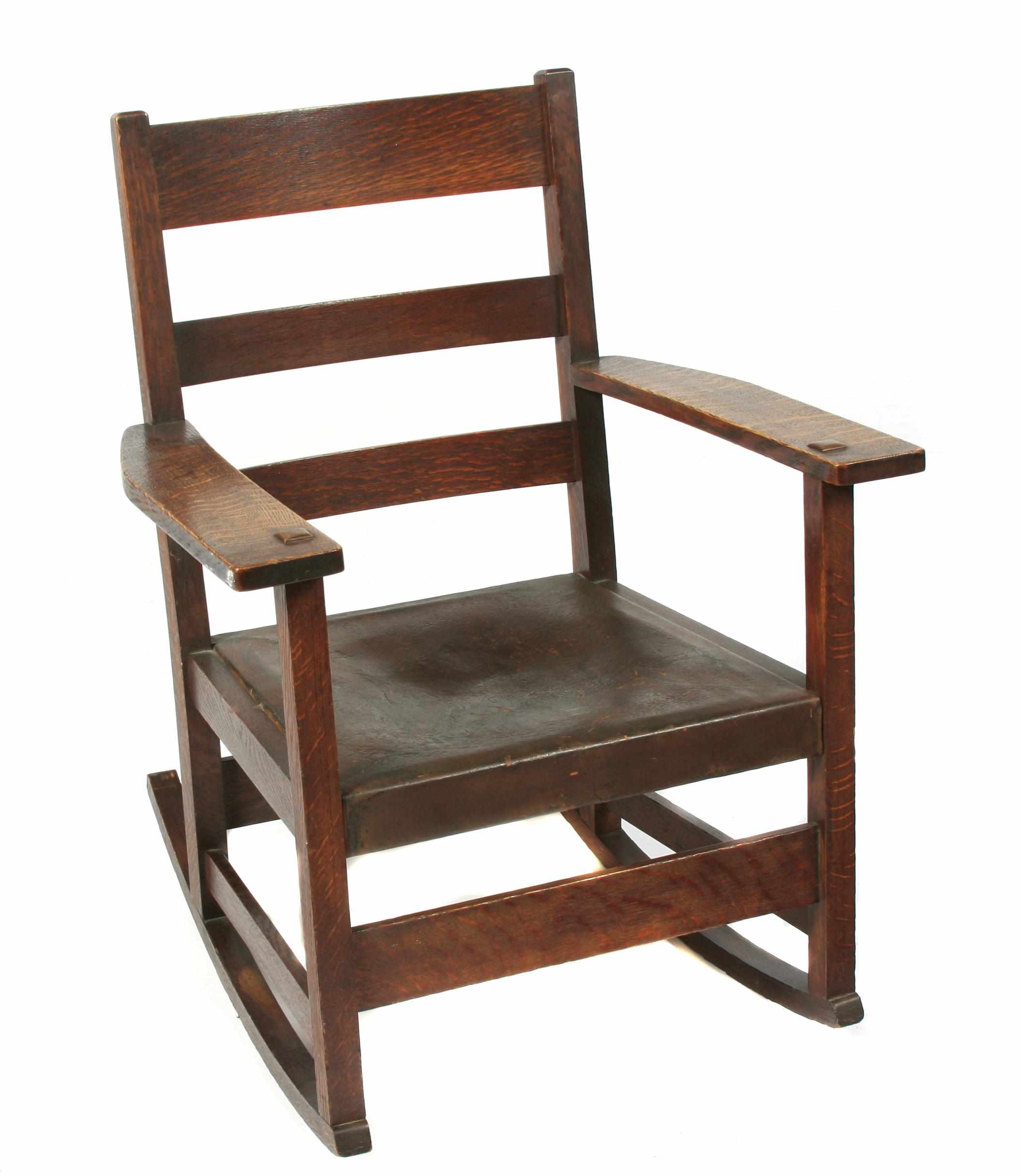 Appraisal: A Gustav Stickley fumed oak diminutive rocking chair height in