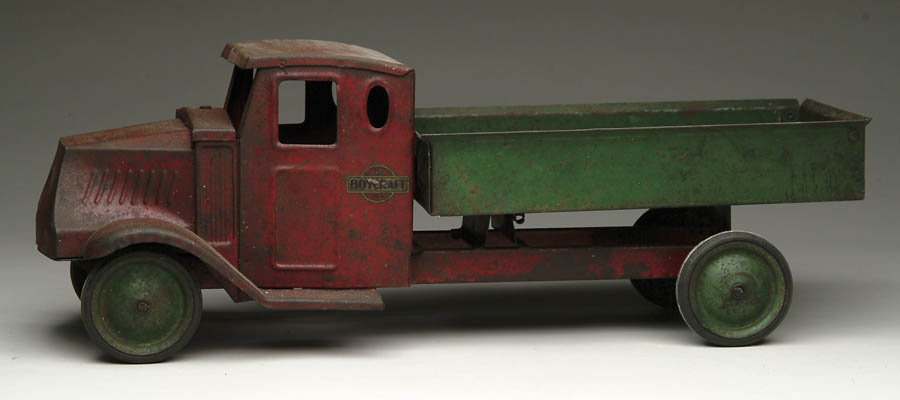 Appraisal: BOYCRAFT STEEL DUMPTRUCK Red truck with green dump mechanism and